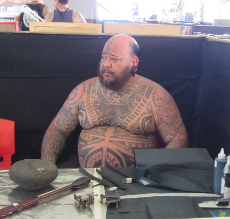 Tattoo Artist in his booth